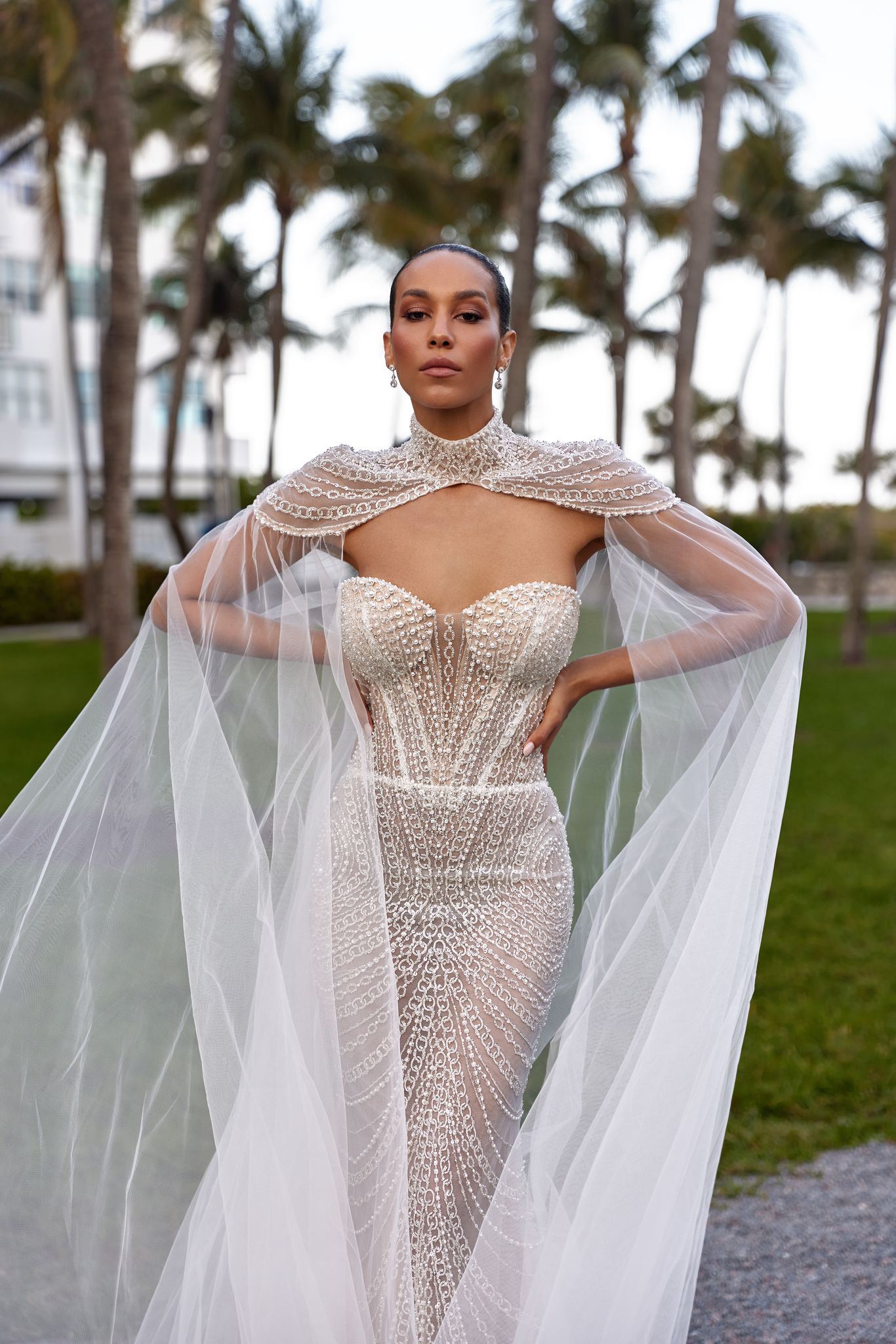 Aislin shimmering lace wedding dress with airy sheer details and glow-from-within effect.