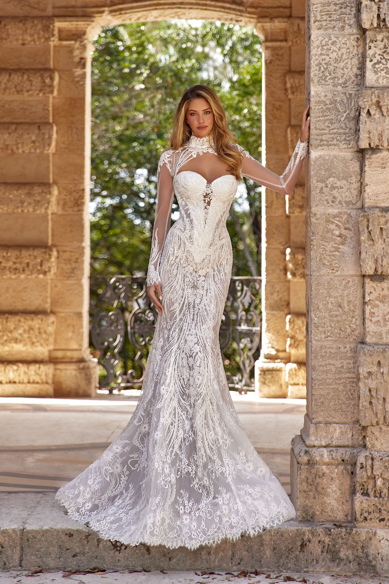 Delilah without train: semi-sheer lace hugging the body with pearls and sequins
