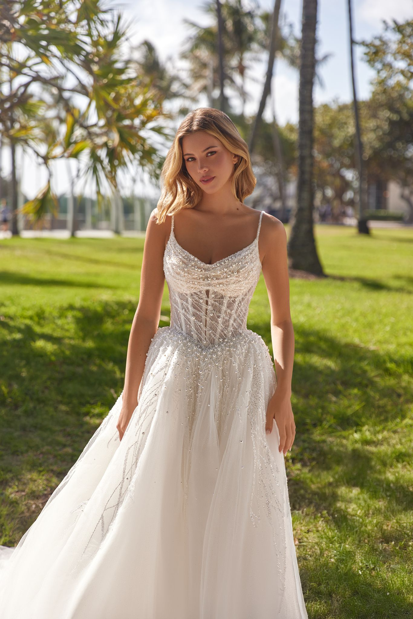 wedding dress Lisandra by OKSANA MUKHA Lisandra gown: flowing A-line with lace bodice and over a thousand sparkling pearls