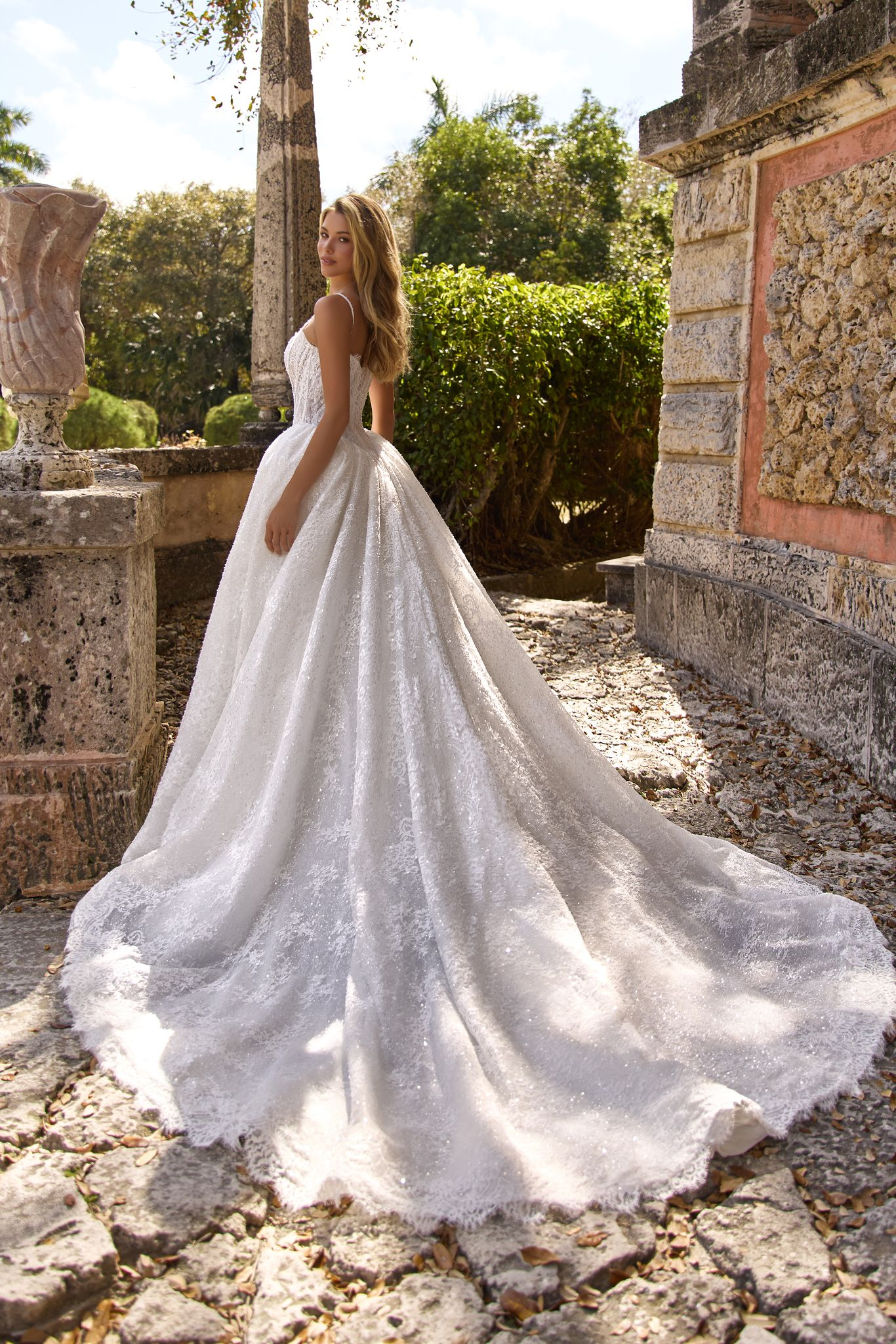 Majestic Octavia gown: luminous lace, sequins, and structured silhouette for ceremony