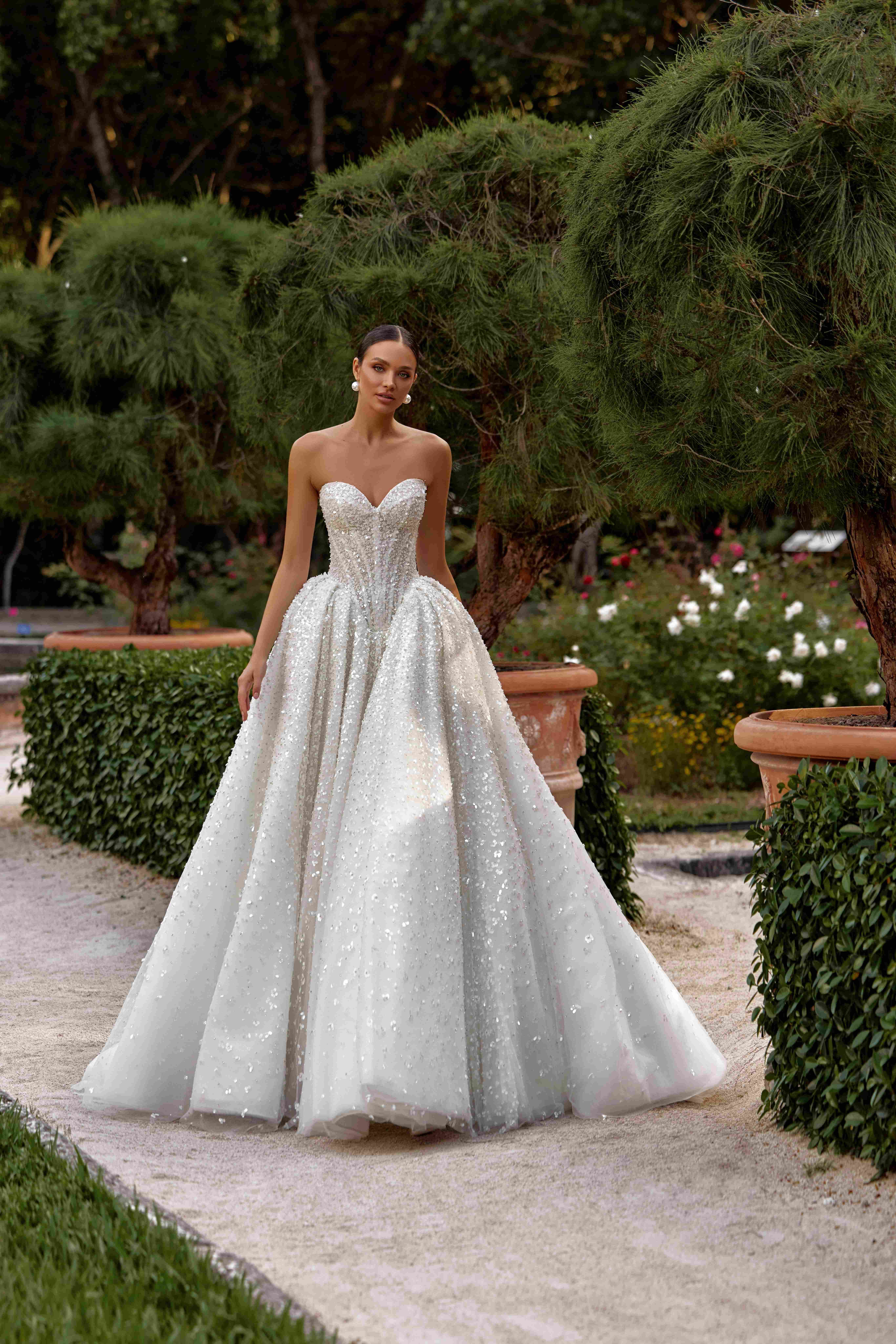 Elegant Ingrid gown: gathered skirt, hand-embroidered details, and radiant sparkle