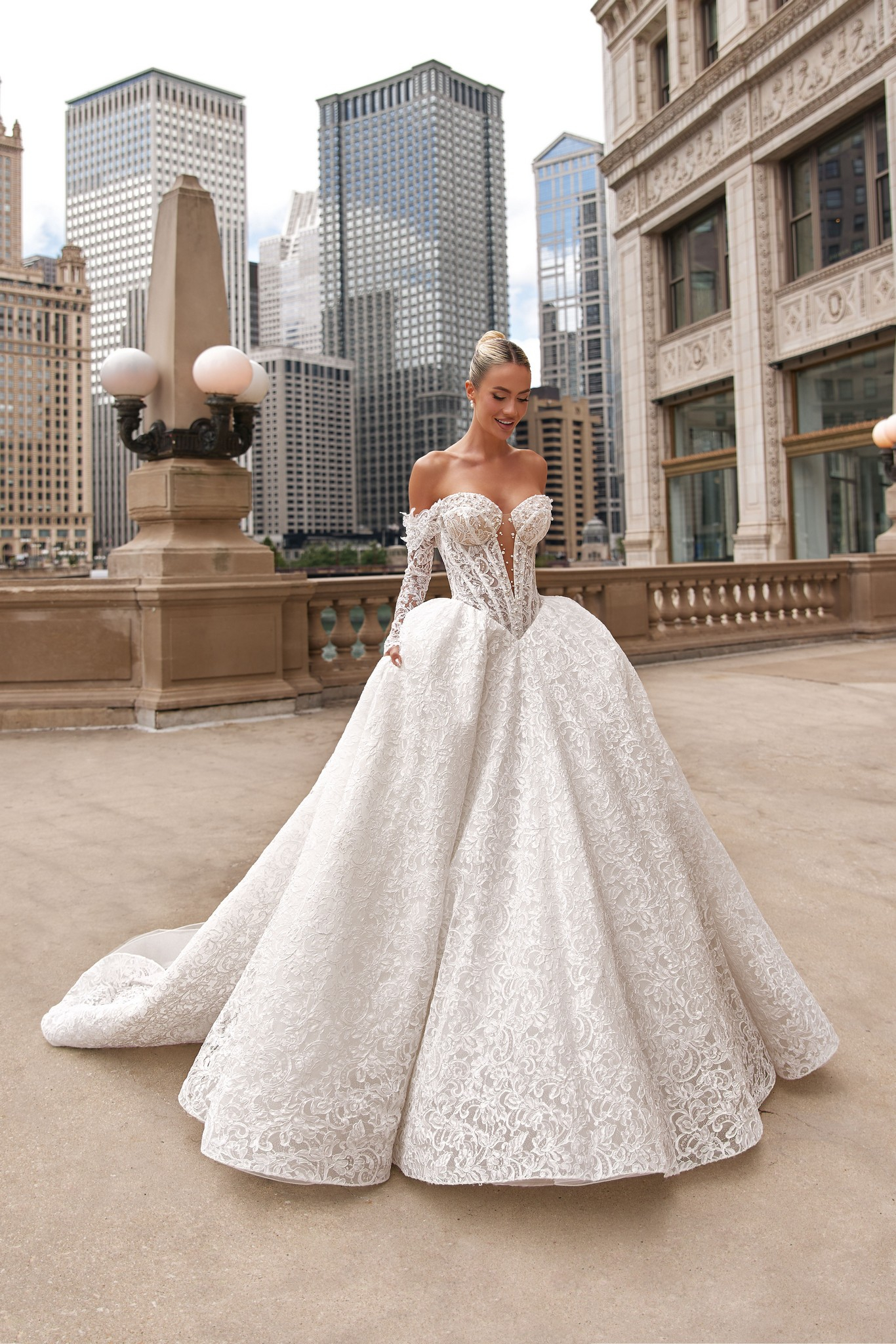 Amour bridal look: romantic silhouette with flowing skirt and delicate embellishments