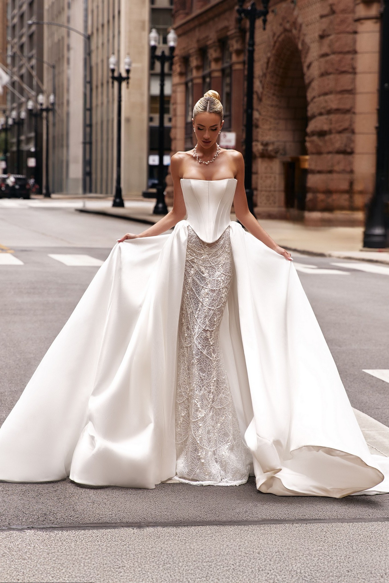 wedding dress Augusta by OKSANA MUKHA Augusta bridal look: precise waist lacing and theatrical 70 cm satin train