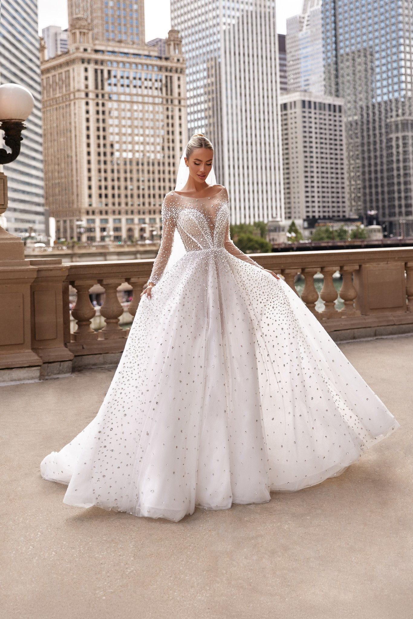 Bridal Elle gown: graceful silhouette with sparkling flowers and gentle train