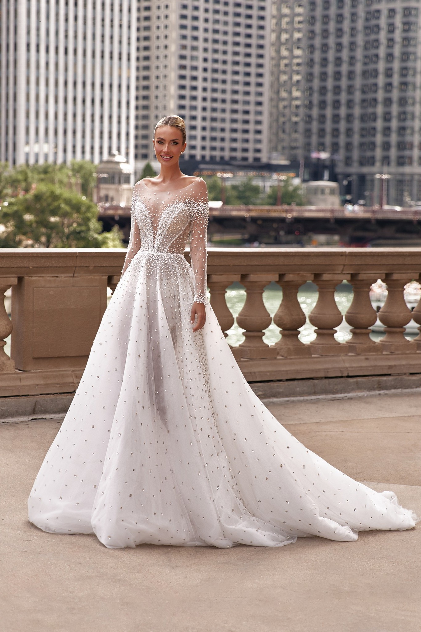 Bridal Elle: flowing silhouette with delicate lace and shimmering pearl details