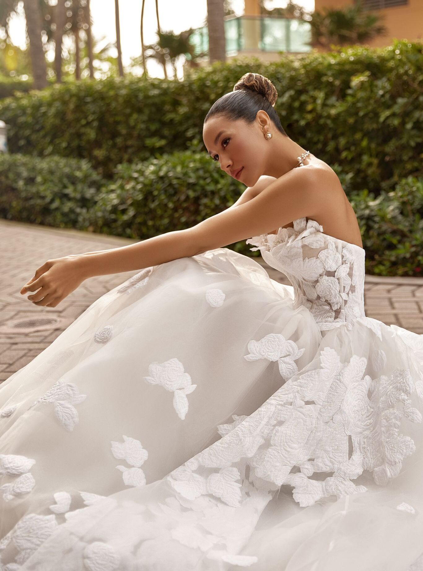 Dreamy Odetta bridal gown with 3D appliqués, pearls and soft voluminous layers