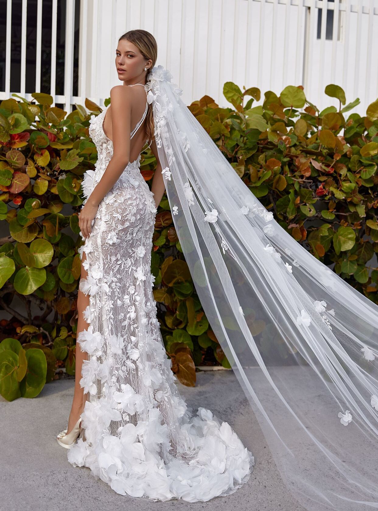 wedding dress Seren by OKSANA MUKHA Artistic Seren gown blending bold femininity with soft, romantic floral details.