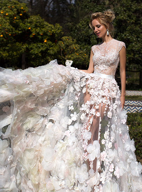 Romantic bridal gown with 3D flowers and satin sash