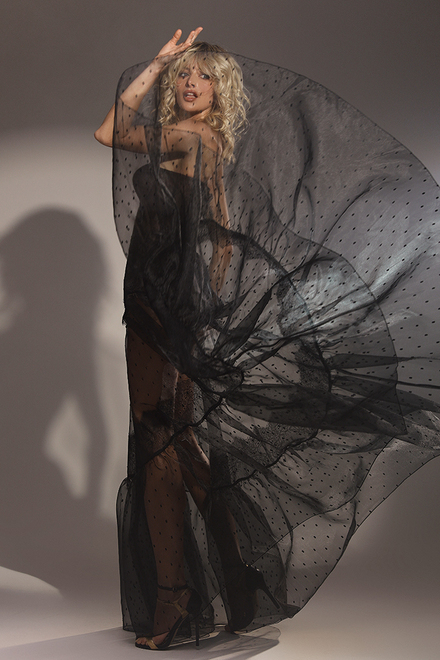Transparent evening dress with slit
