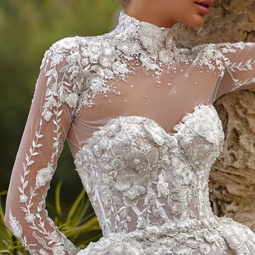 wedding dress Elara with cape by OKSANA MUKHA photo of wedding dress Elara with cape: ivory
